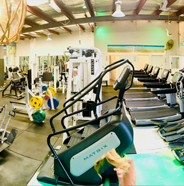 Fully equipped gym with cardio machines at Re-Creation Health Club Sorrento